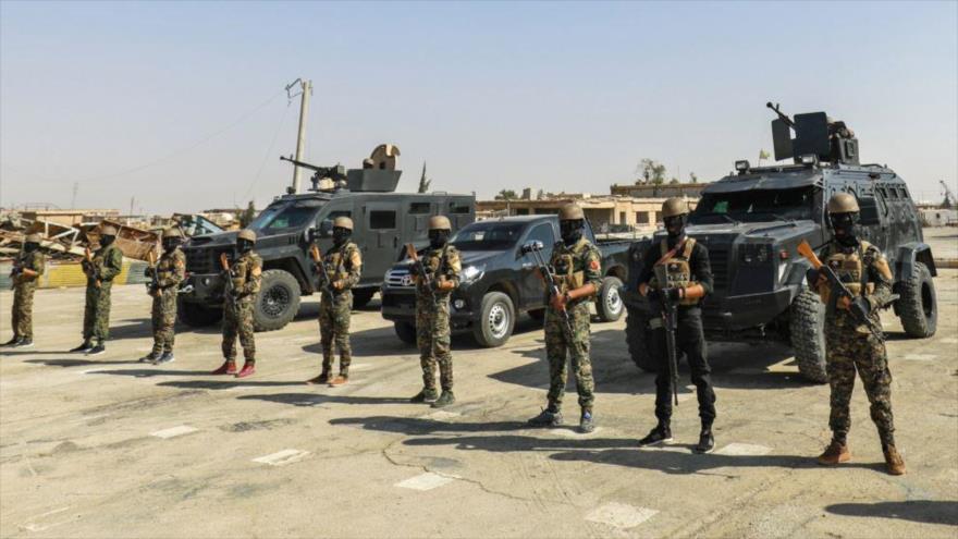 Combatientes de las llamadas Fuerzas Democráticas Sirias (FDS) en la ciudad de Hayin.