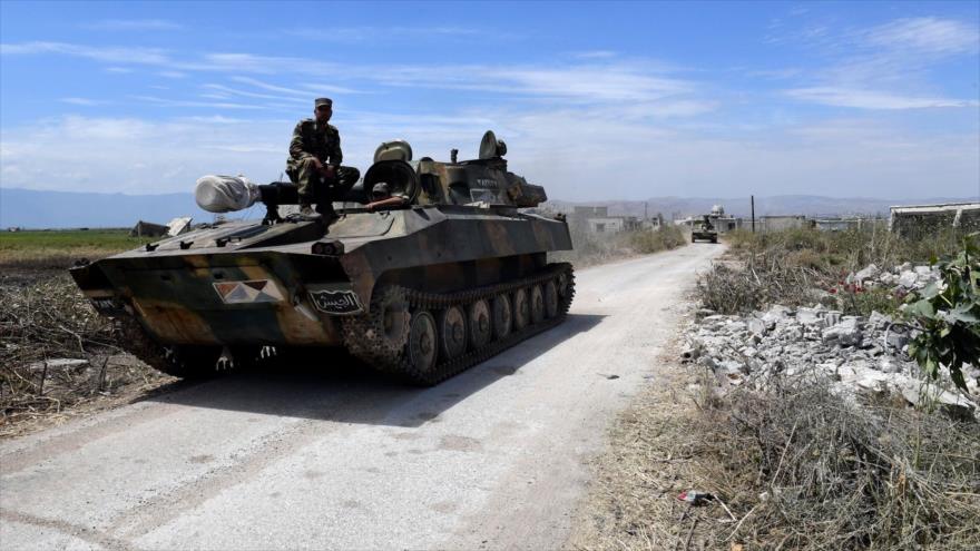 Los tanques del Ejército de Siria desplegados en la provincia de Hama, 11 de mayo de 2019. (Foto: AFP)