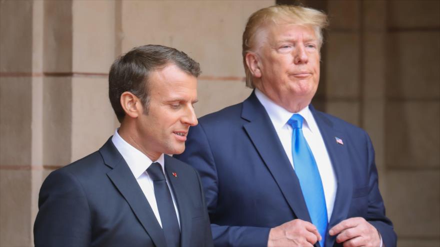 Los presidentes de Francia y EE.UU., Emmanuel Macron y Donald Trump (drcha.), respectivamente, en una ceremonia en NormandÃ­a, 6 de junio de 2019. (Foto: AFP)