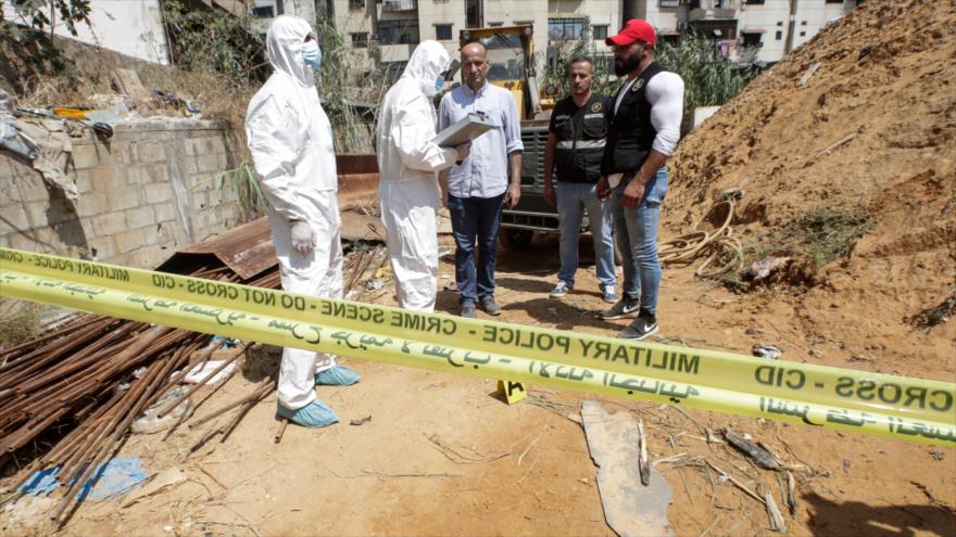 Investigadores forenses en el lugar donde cayeron dos drones israelíes en el sur de Beirut, capital de El Líbano, 25 de agosto de 2019. (Foto: AFP)