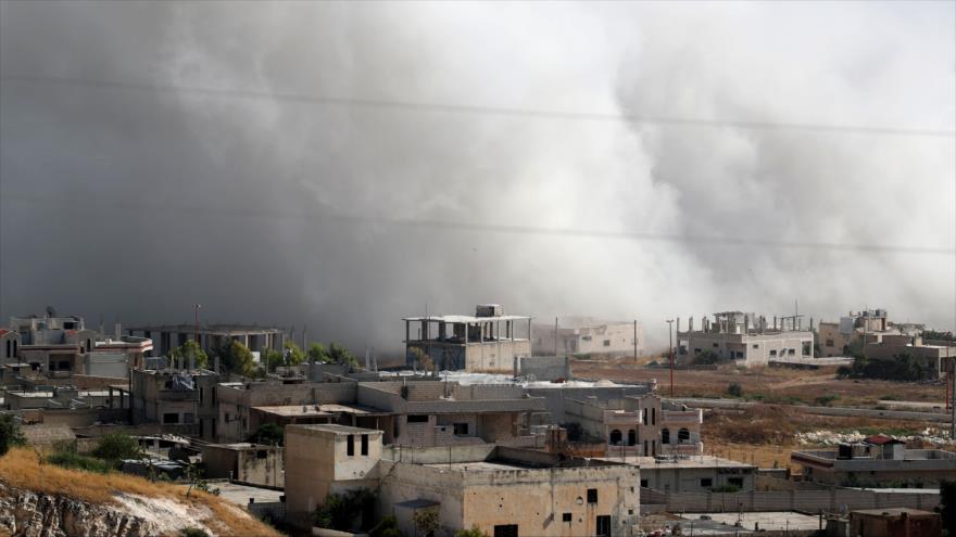 El Ejército sirio ataca con misiles una fortificación de terroristas en Jan Sheijun, en Idlib, 19 de julio de 2019. (Foto: AFP)