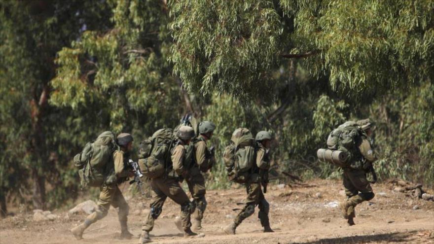  Soldados israelíes en las maniobras que simulan un enfrentamiento con Hezbolá, en los Altos del Golán, 7 de septiembre de 2015.