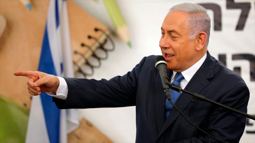 El premier israelí, Benjamín Netanyahu, habla en el asentamiento ilegal de Elkana, en la ocupada Cisjordania, 1 de agosto de 2019. (Foto: AFP) 