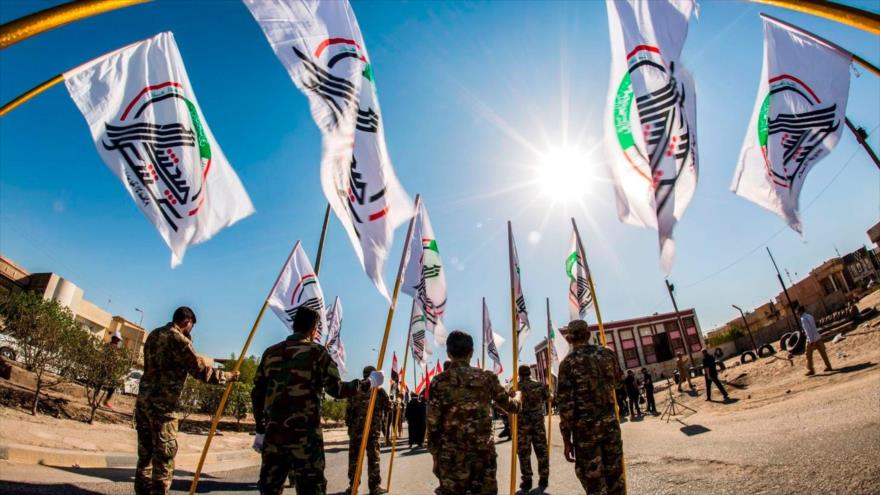 Miembros de las Unidades de Movilización Popular de Irak (UMP o Al-Hashad Al-Shabi, en árabe) en Basora, 31 de mayo de 2019.