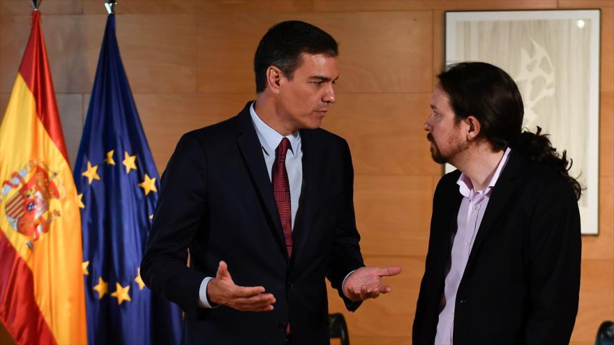 El presidente del Gobierno español en funciones, Pedro Sánchez (izq.), y el líder de Unidas Podemos, Pablo Iglesias, en Madrid, 9 de julio de 2019. (Foto: AFP)