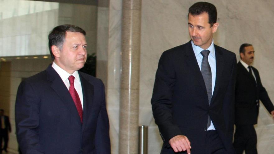El presidente de Siria, Bashar al-Asad, (dcha.) y el rey de Jordania Abdolá II, Damasco, 11 de mayo de 2009.
