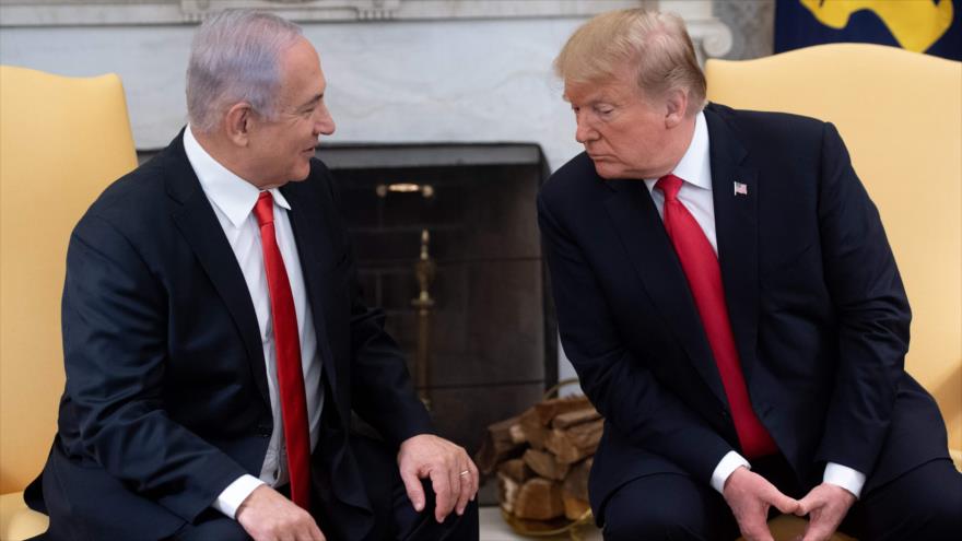 El presidente de EE.UU., Donald Trump (dcha.) se reúne con el premier israelí, Benjamín Netanyahu, en Casa Blanca, 25 de marzo de 2019. (Foto: AFP)