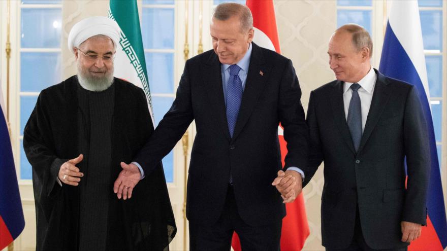 Los presidentes de Irán, Turquía y Rusia (de izda. a dcha.) en Ankara, 16 de septiembre de 2019. (Foto: AFP)