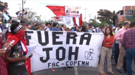 Ciudadanos hondureños señalan a su presidente de narcotraficante