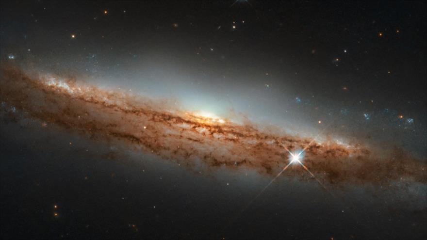 Publican foto de una galaxia espiral con forma de platillo volante | HISPANTV