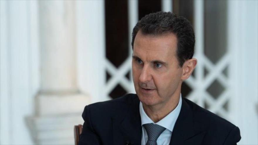 El presidente de Siria, Bashar al-Asad, (dcha.) en una entrevista con Al-Sourea and Al-Ikhbariya TV, 31 de octubre de 2019.