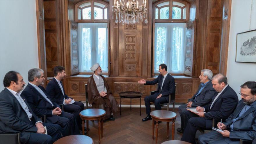 Presidente de Siria, Bashar al-Asad, (4.º a la dcha.) se reúne con una delegación parlamentaria iraní en Damasco, 14 de noviembre de 2019.