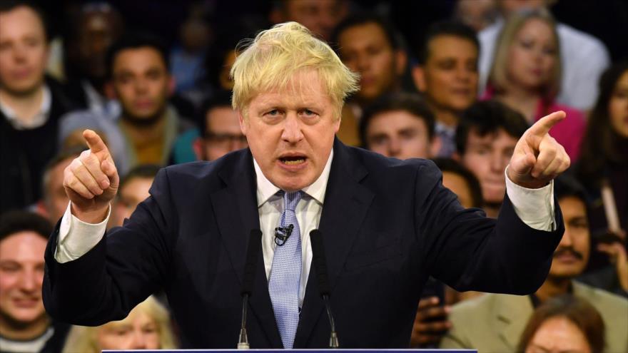 El premier británico, Boris Johnson, en un mitin de campaña de las elecciones generales, Londres, 11 de diciembre de 2019. (Foto: AFP)
