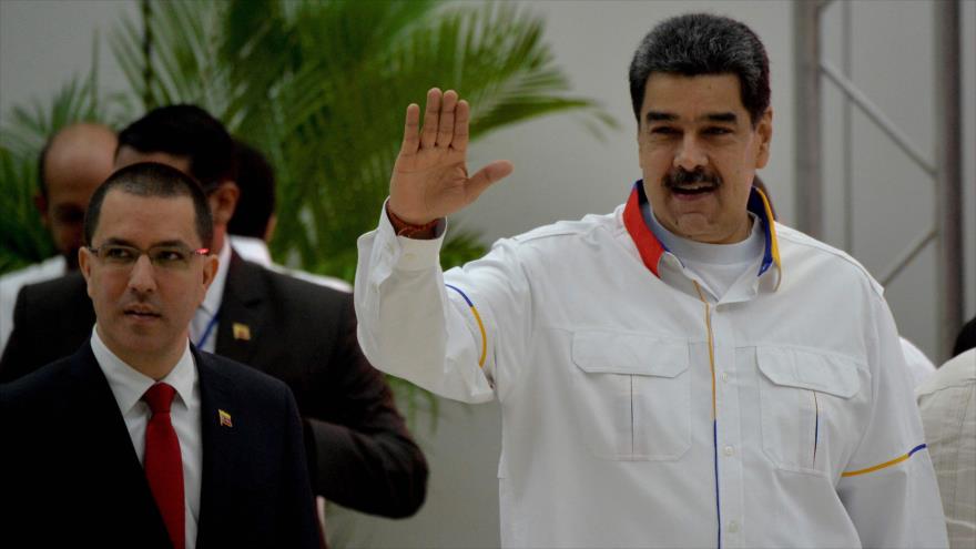El canciller venezolano, Jorge Arreaza, junto al presidente, Nicolás Maduro (dcha.), La Habana, 14 de diciembre de 2019. (Foto: AFP)