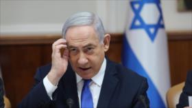 Netanyahu, imputado de corrupción, renuncia a cargos ministeriales