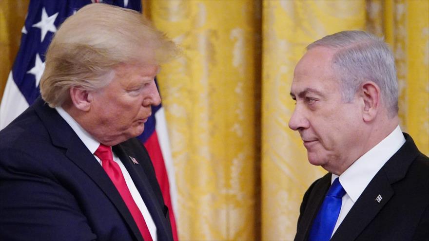 El primer ministro israelí, Benjamín Netanyahu (dcha.) y el presidente de EE.UU., Donald Trump, en la Casa Blanca, 28 de enero de 2020. (Foto: AFP)