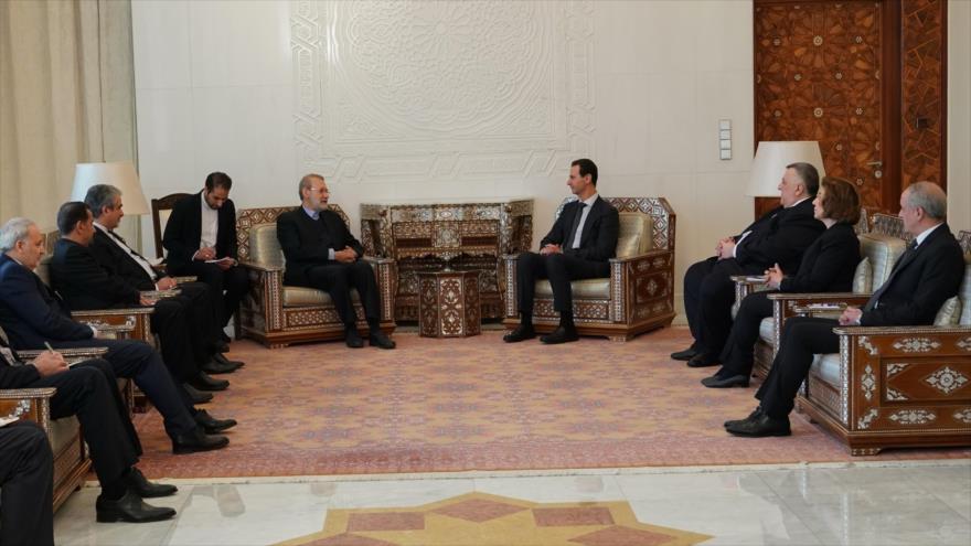 El presidente del Parlamento iraní, Ali Lariyani, se reúne con el presidente sirio, Bashar al-Asad, en Damasco, 16 de febrero de 2020. 