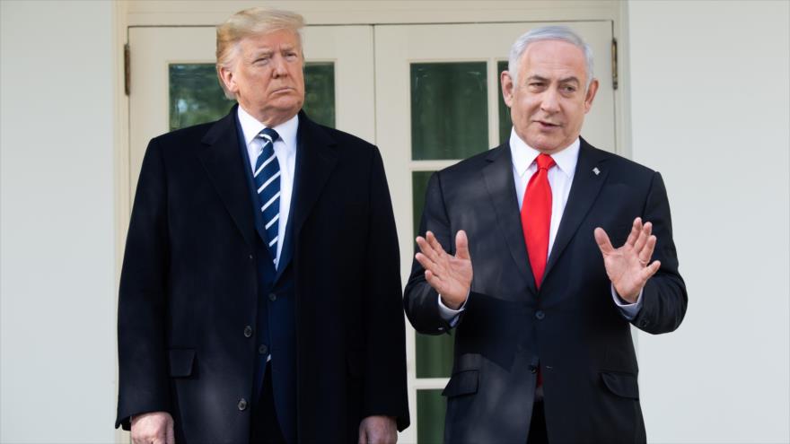 El presidente de EE.UU., Donald Trump (izda.), y el premier israelí en funciones, Benjamín Netanyahu, en la Casa Blanca, 27 de enero de 2020. (Foto: AFP)