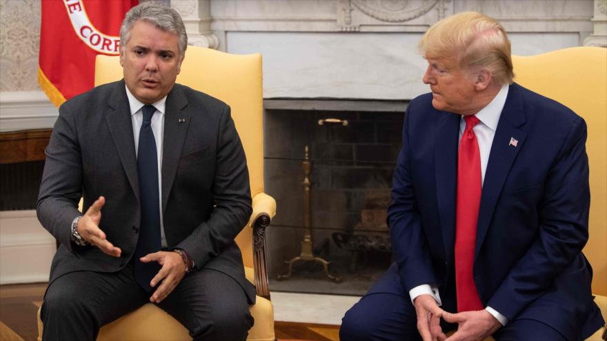 El presidente colombiano, Ivan Duque (izq.), se reúne con su homólogo estadounidense, Donald Trump, en Washington, 2 de marzo de 2020. (Foto: AFP)