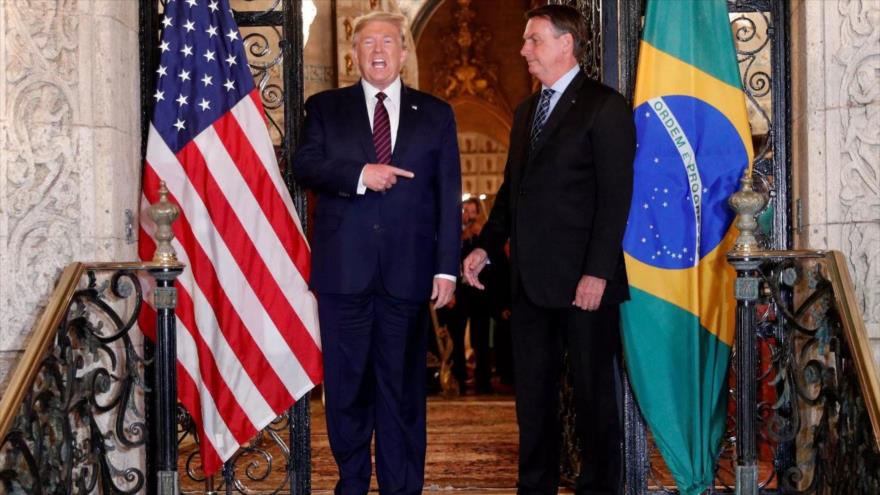 El presidente brasileño, Jair Bolsonaro (dcha.), y su par estadounidense, Donald Trump, en Florida (EE.UU.), 7 de marzo de 2020. (Foto: Reuters)