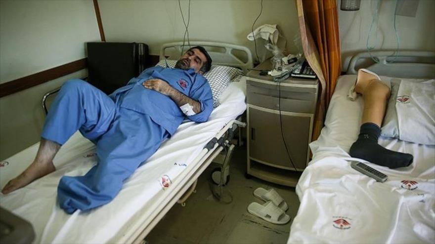 Veterano iraní de la guerra impuesta por Irak, víctima de armas químicas, en un hospital en Teherán, capital de Irán. (Foto: Tasnim)