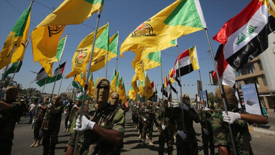 Combatientes del Movimiento de Resistencia Islámica de Irak (Kataib Hezbolá), durante un desfile militar en Bagdad (capital), 31 de mayo de 2019. (Foto: AFP)
