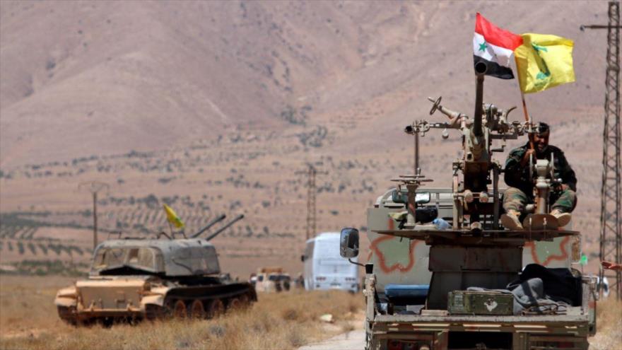 Combatientes de Hezbolá desplegados en la región de Al-Qalamun, al norte de Damasco (capital siria), 28 de agosto de 2017. (Fuente: Reutres)
