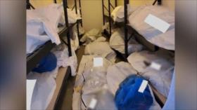 Fotos: Cadáveres apilados en habitaciones de un hospital en EEUU