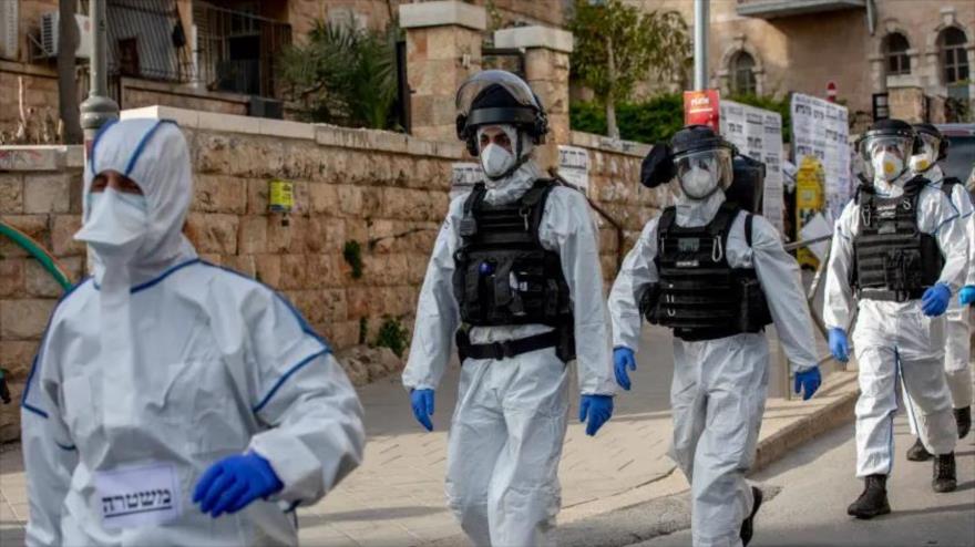 Agentes de la policía del régimen de Israel en la ciudad de Al-Quds (Jerusalén), 6 de abril de 2020.
