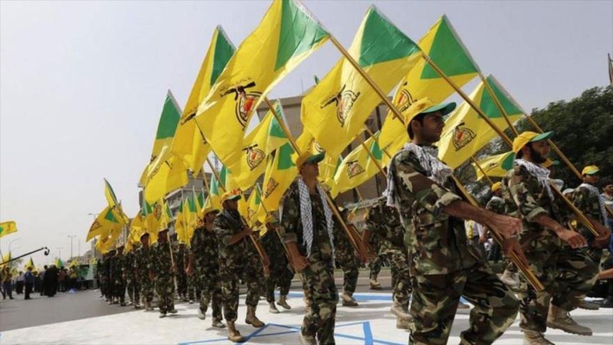 Integrantes del Movimiento de Resistencia Islámica de Irak, conocido como Kataeb Hezbolá.