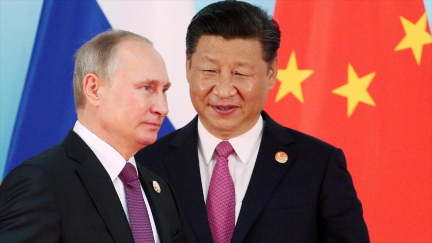 El presidente ruso, Vladimir Putin (izda.), y su par chino, Xi Jinping. (Foto: Reuters)