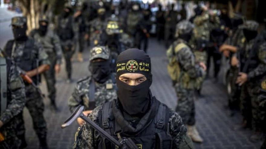 Miembros del movimiento de la Yihad Islámica Palestina marchan durante un desfile militar en la ciudad de Gaza, 4 de octubre de 2018. (Foto: AFP)