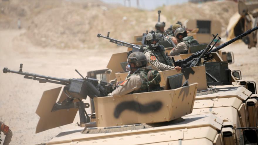 Fuerzas de seguridad iraquíes en las afueras de Faluya, al oeste de Bagdad, la capital. (Foto: Reuters)