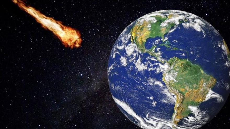 Imagen representativa de un asteroide acercándose a la Tierra.