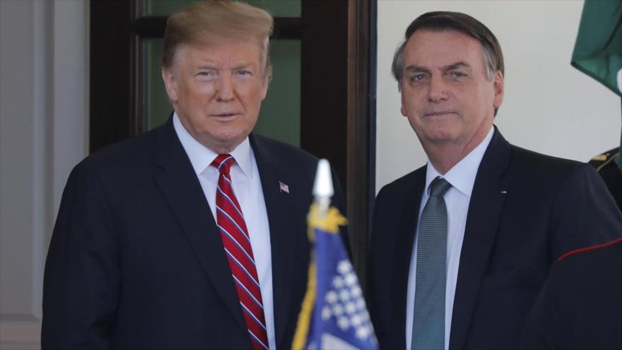 El presidente de EE.UU, Donald Trump (izq.), y su par brasileño, Jair Bolsonaro.