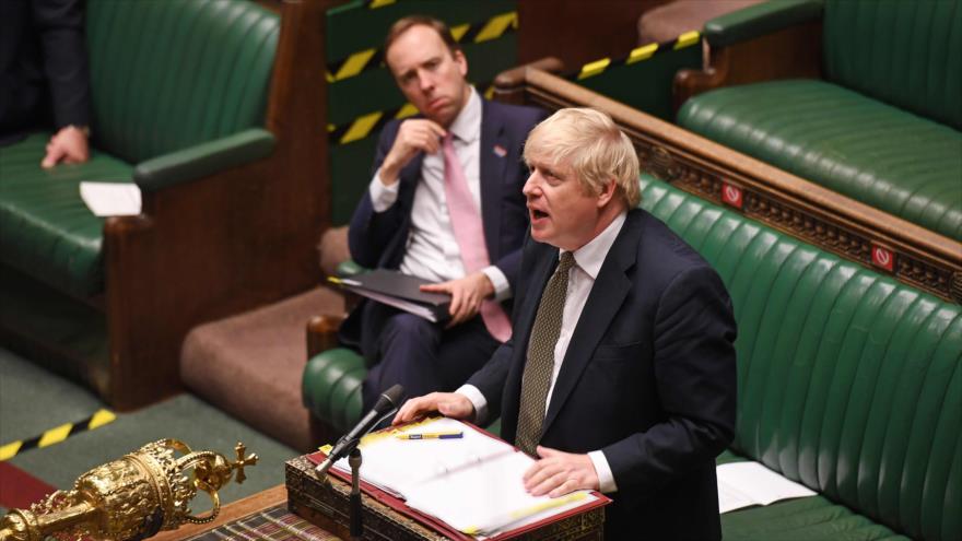 Boris Johnson, primer ministro del Reino Unido, habla durante una sesión parlamentaria, 6 de mayo de 2020. (Foto: AFP)