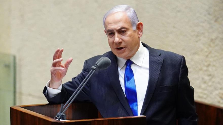 El premier israelí, Benjamín Netanyahu, ofrece un discurso durante una sesión en el parlamento, Al-Quds (Jerusalén), 17 de mayo de 2020. (Foto: AFP)