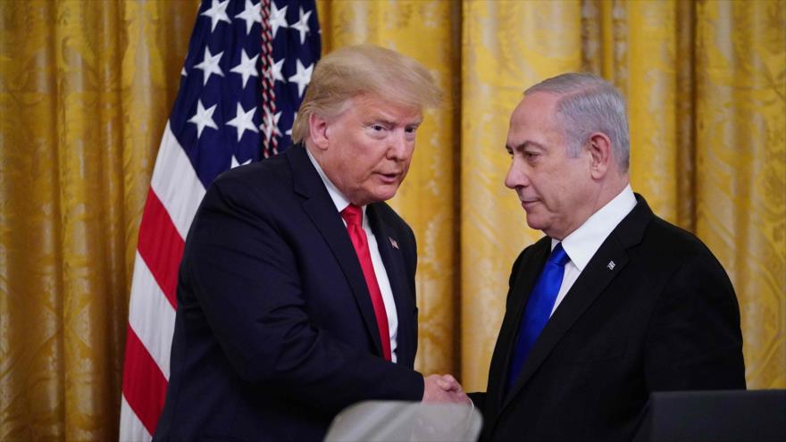 El presidente de EE.UU., Donald Trump (dcha.), y el premier de Israel, Benjamín Netanyahu, en la Casa Blanca, 28 de enero de 2020. (Foto: AFP)
