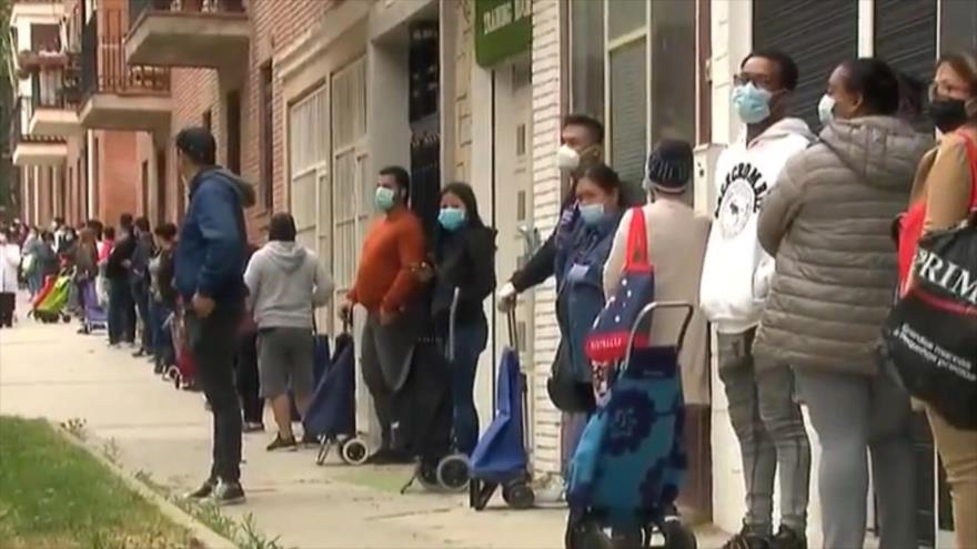Coronavirus lleva a madrileños a formar “colas de hambre” 