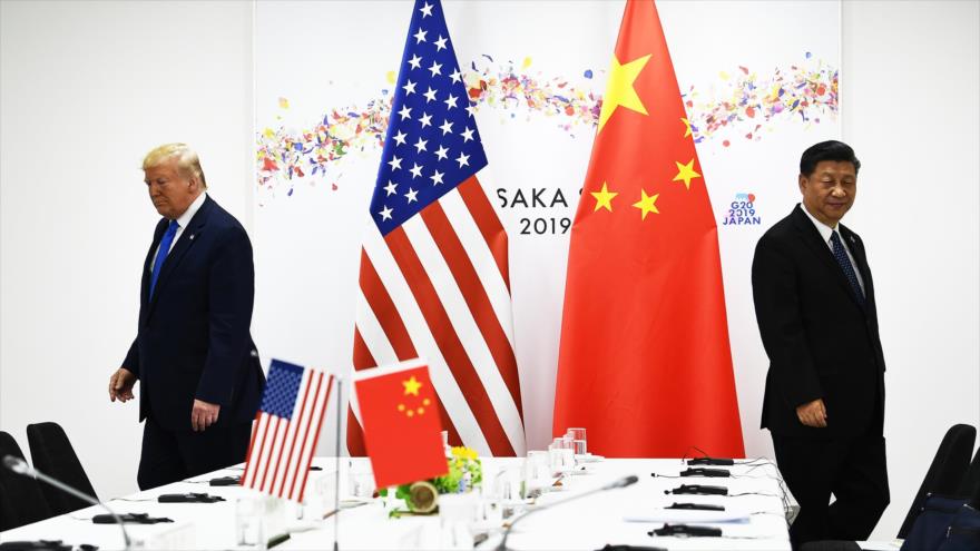 El presidente de EE.UU., Donald Trump (izda.), y su par chino, Xi Jinping, en la Cumbre del G20 en Osaka (Japón), 29 de junio de 2019.