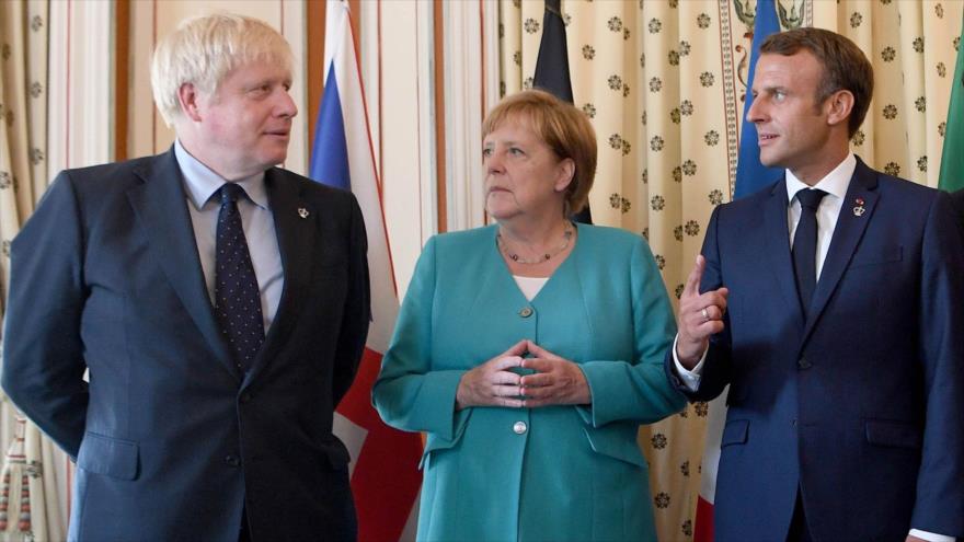 El premier británico, Boris Johnson (izq.), junto con la canciller alemana, Angela Merkel, y el presidente francés, Emmanuel Macron.