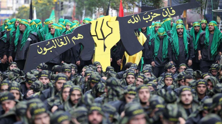 Combatientes de Hezbolá en un acto conmemorativo del Día de Ashura en Beirut, capital de El Líbano.