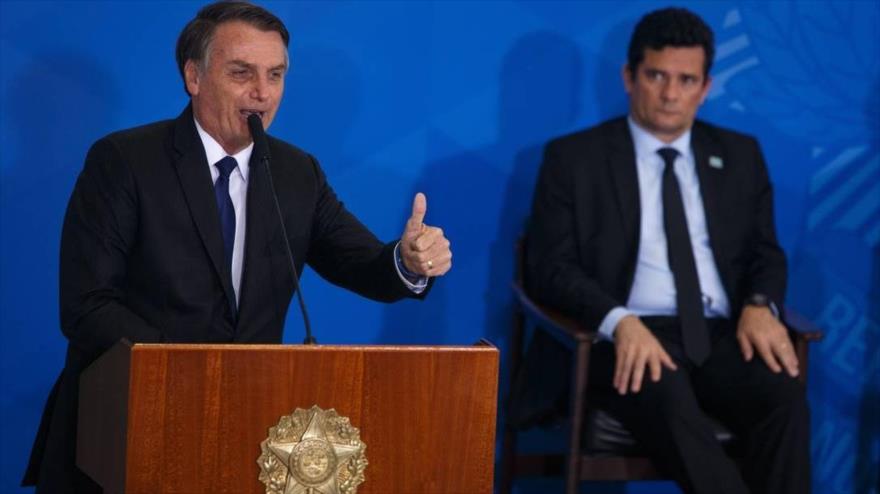 El presidente brasileño, Jair Bolsonaro, junto a su entonces ministro de Justicia, Sergio Moro. 