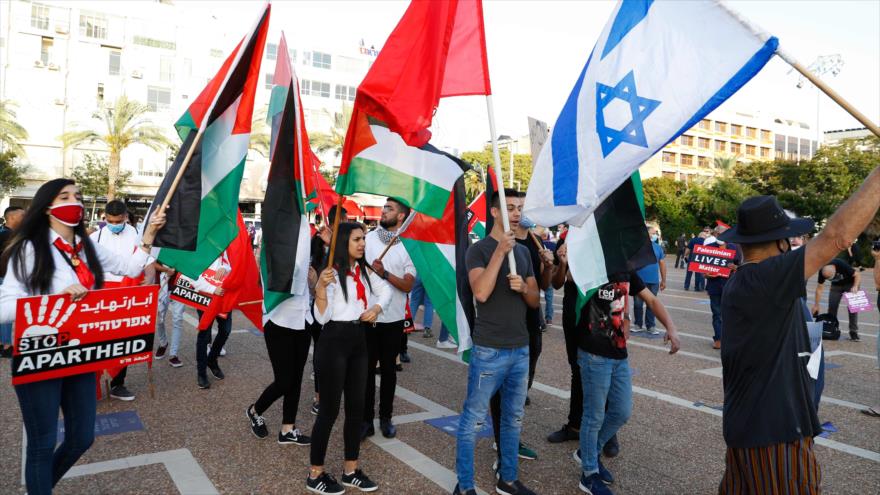 Los manifestases protestan contra el plan del régimen de Israel para anexionarse partes de Cisjordania, 6 de junio de 2020. (Foto: AFP)
