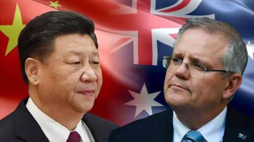 El presidente chino, Xi Jinping (izda.), y el primer ministro australiano, Scott Morrison.