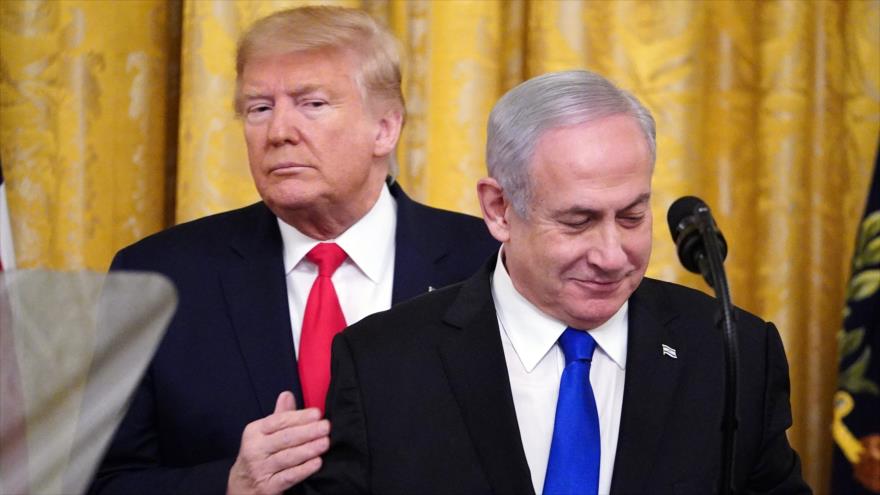 El presidente de EE.UU., Donald Trump (izda.), y el premier israelí, Benjamín Netanyahu, en un acto en Washington, 28 de enero de 2020. (Foto: AFP)