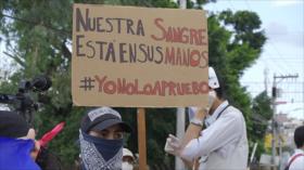 Hondureños protestan contra el presidente Juan Orlando Hernández
