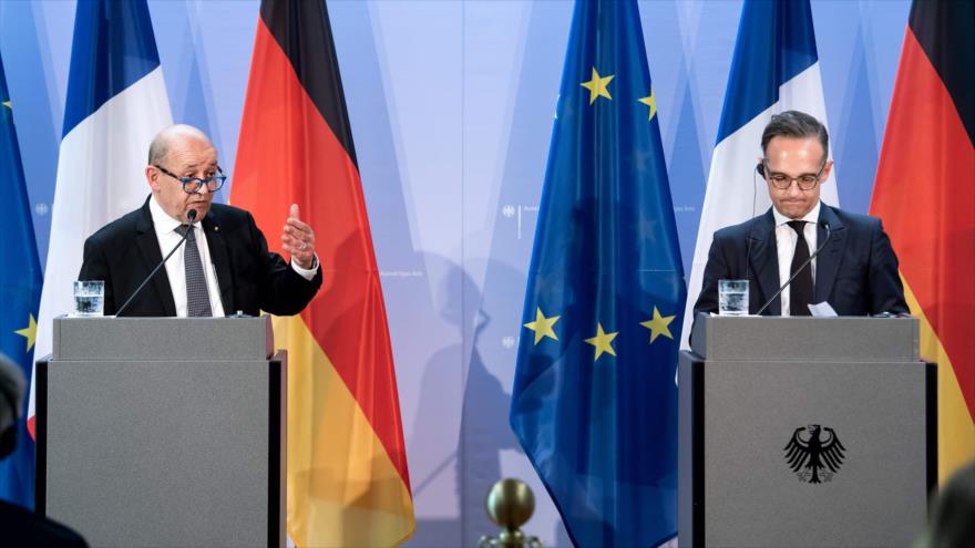 El ministro de Exteriores alemán, Heiko Maas (dcha.) y su par francés, Jean-Yves Le Drian, en una rueda de prensa en Berlín, 19 de junio de 2020. (Foto: AFP)