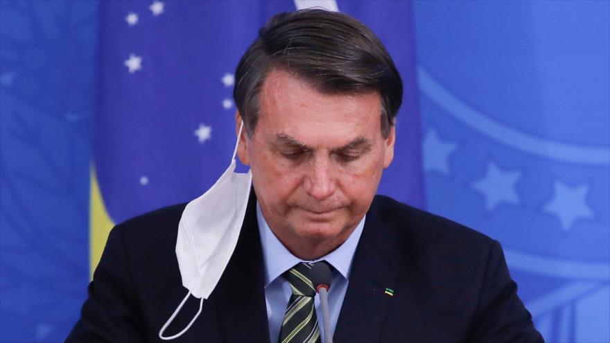 El presidente de Brasil, Jair Bolsonaro, durante una rueda de prensa en Brasilia, la capital, 18 de marzo de 2020. (Foto: AFP)