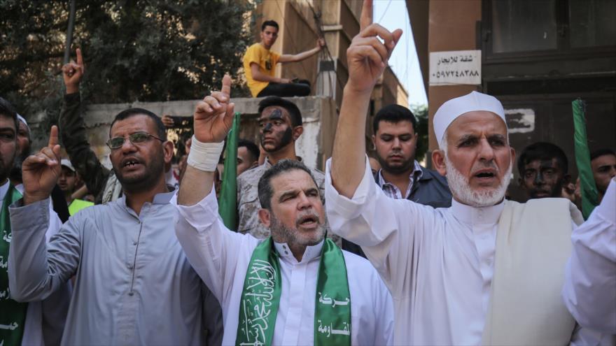 Partidarios de HAMAS en una protesta contra el plan israelí de anexar partes de Cisjordania, Jan Yunis, Franja de Gaza, 26 de junio de 2020. (Foto: AFP)